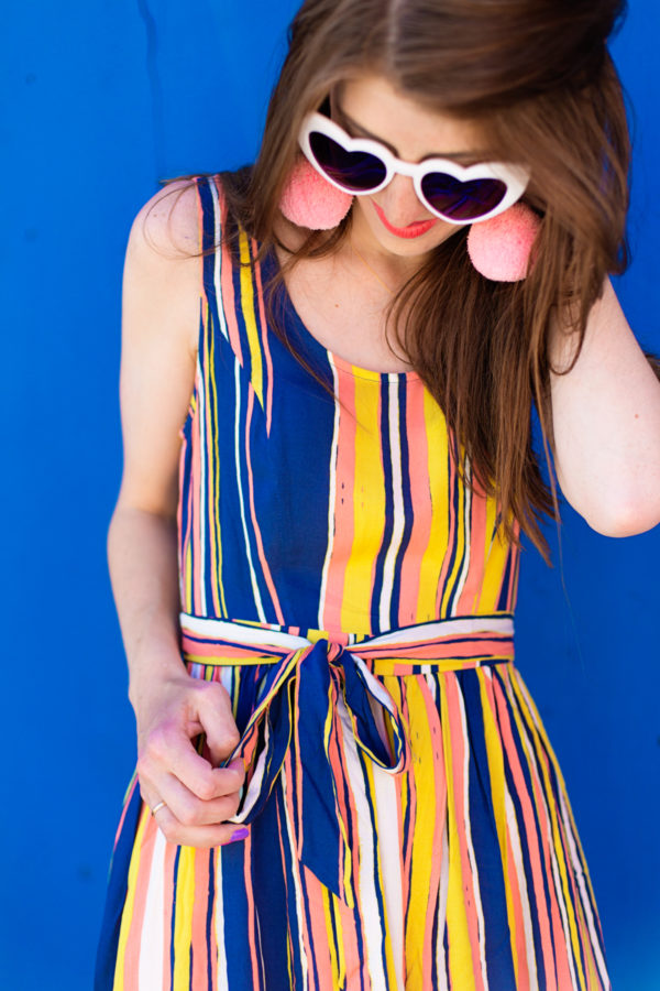 A woman wearing sunglasses posing for the camera