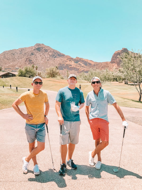 Three men golfing