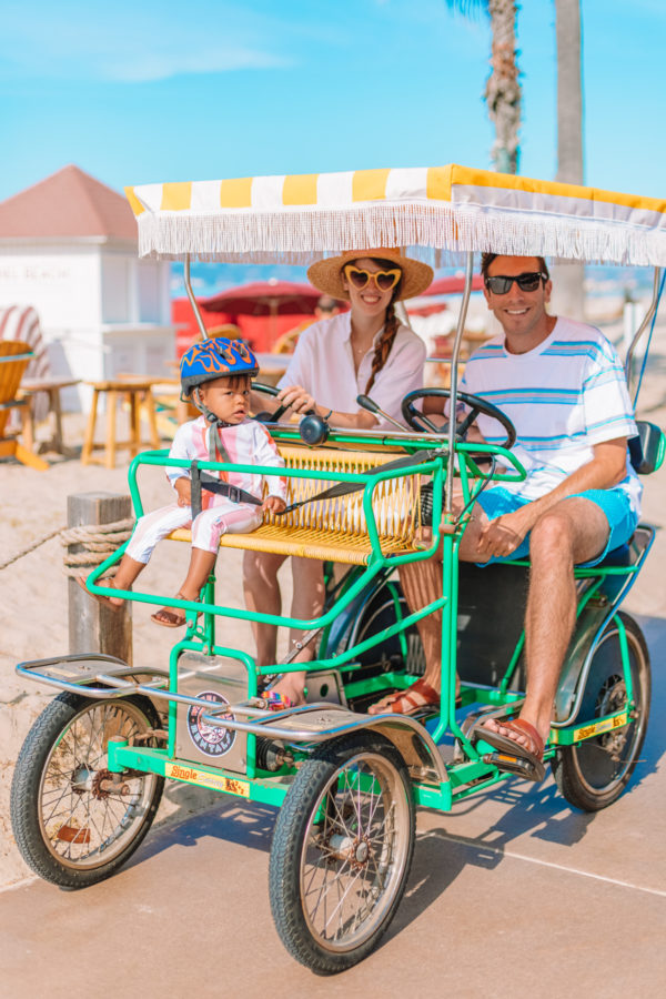 A family riding in a bicycle