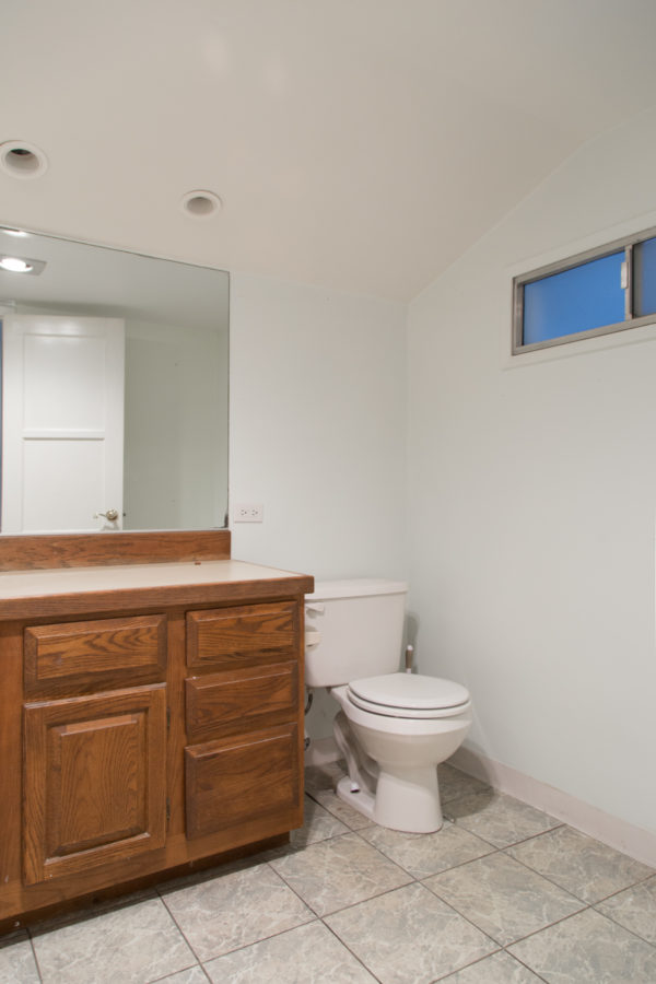 A bathroom with a toilet