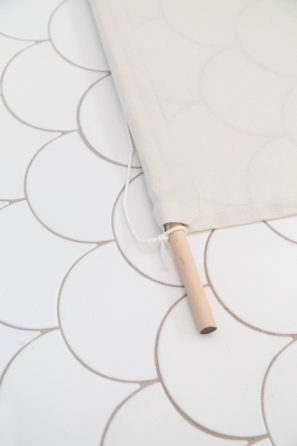 Felt with wooden stick