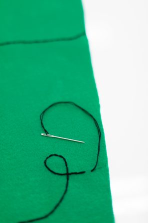 Green felt and black string