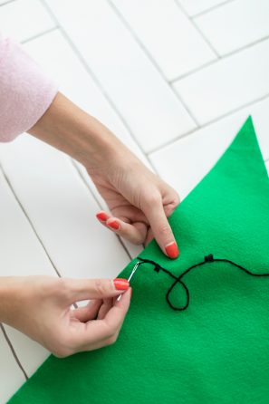 Green felt and black string