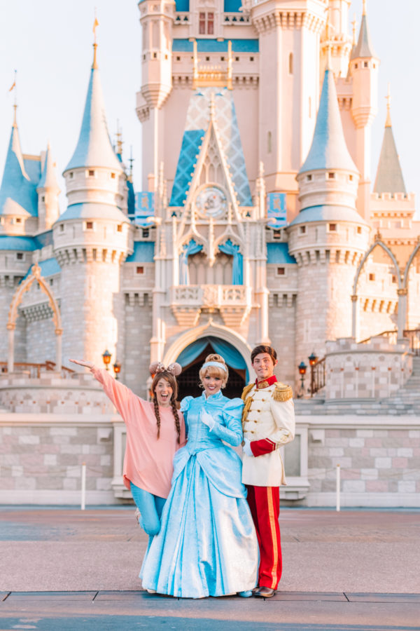 People standing in front of a castle
