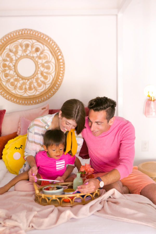 A family on a bed