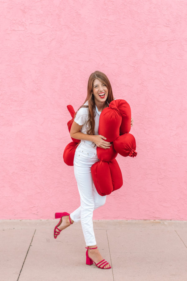 A woman in a balloon dog costume