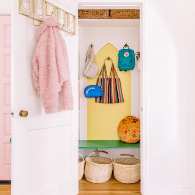 The Mindwelling: Our Colorful Entry Closet Makeover Closet with bags and baskets