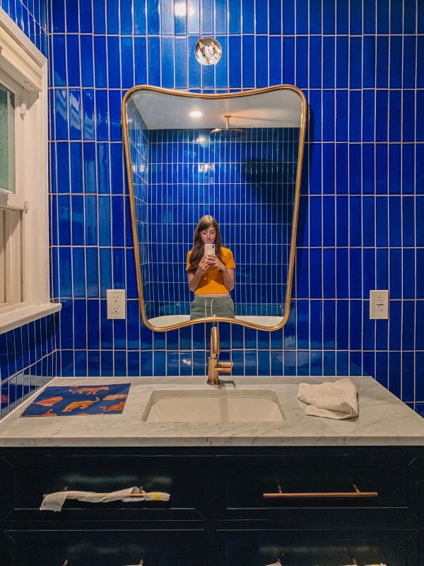 Blue Tile Bathroom with Navy Vanity