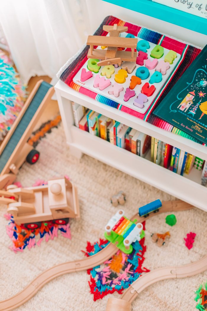 Toys and a colorful bookshelf