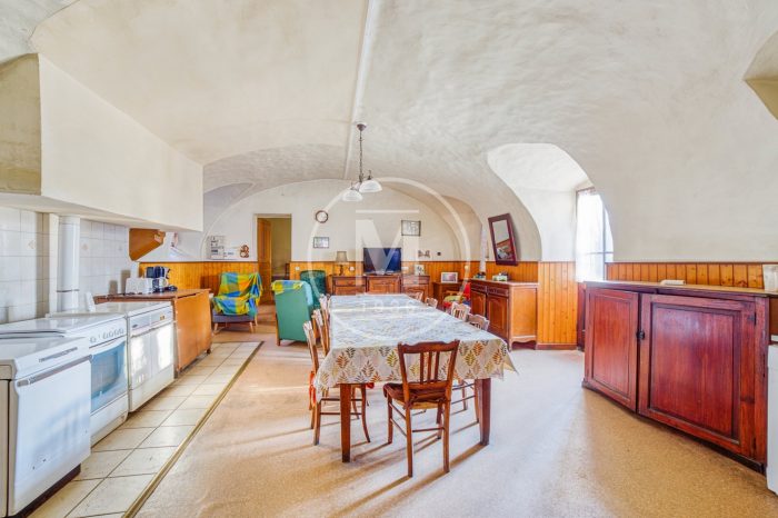 A kitchen with a wood floor