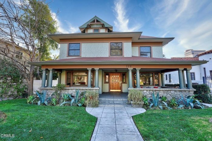 A house with a lawn in front of it