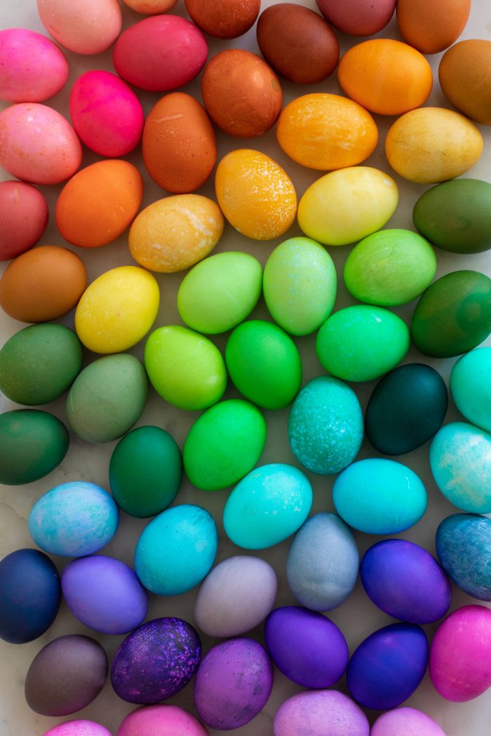 Rainbow Easter Eggs on a marble background. 
