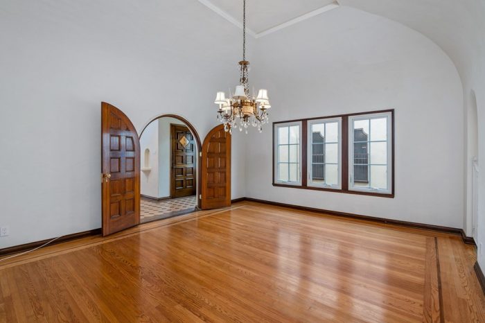 A view of a living room with a wood floor