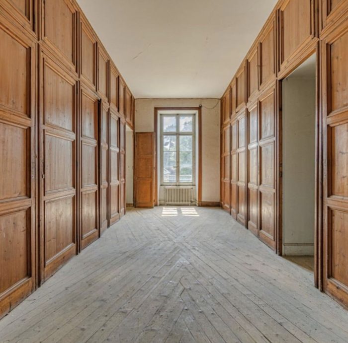 A room with wooden floors and walls