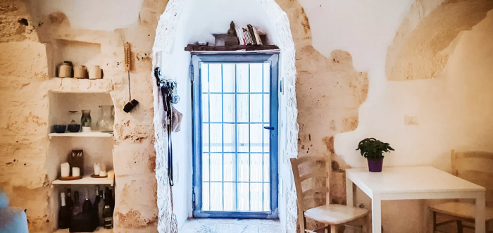 A room with a big blue window