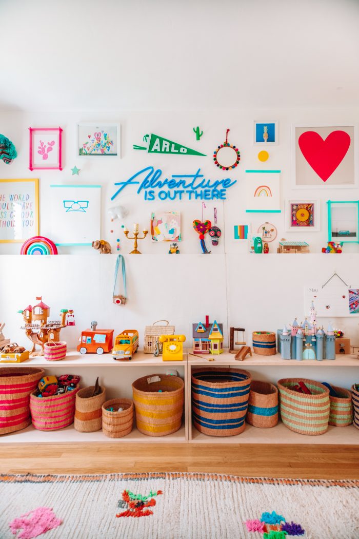 A colorful room with decorations and storage