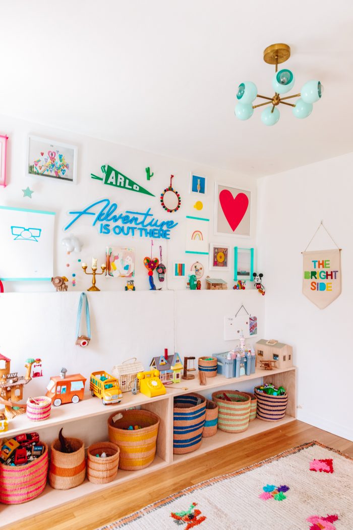 A colorful room with a decorations and storage