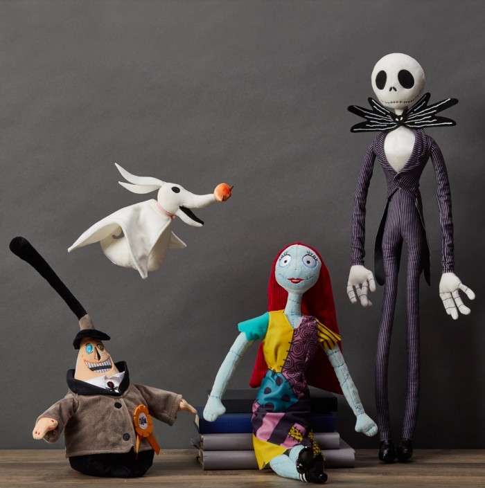 Nightmare Before Christmas plush dolls in front of a gray background