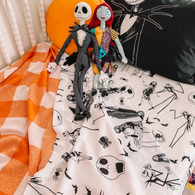 The Best Nightmare Before Christmas Decorations, Games & Gear Nightmare before christmas sheets on bed with stuffed animals and plaid blanket