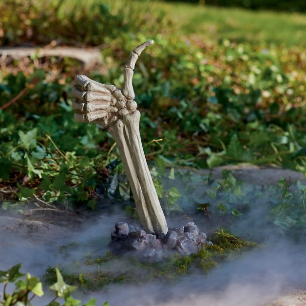 Skeleton Thumbs Up in a yard