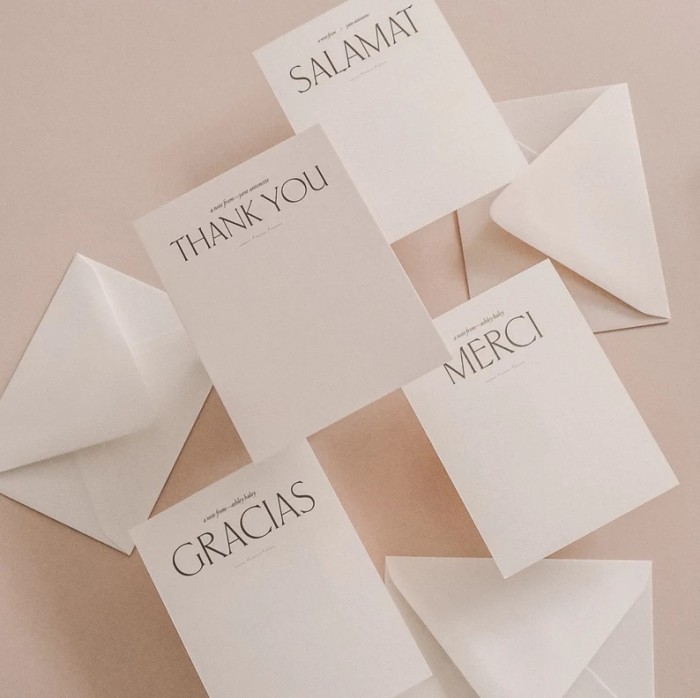 personalized thank you stationery on a pink table