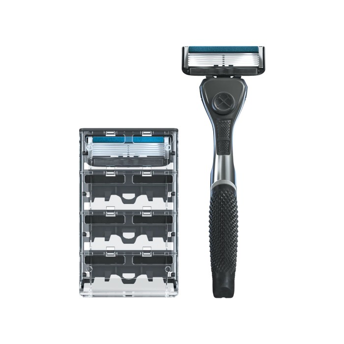 Razor and razor blades on white background