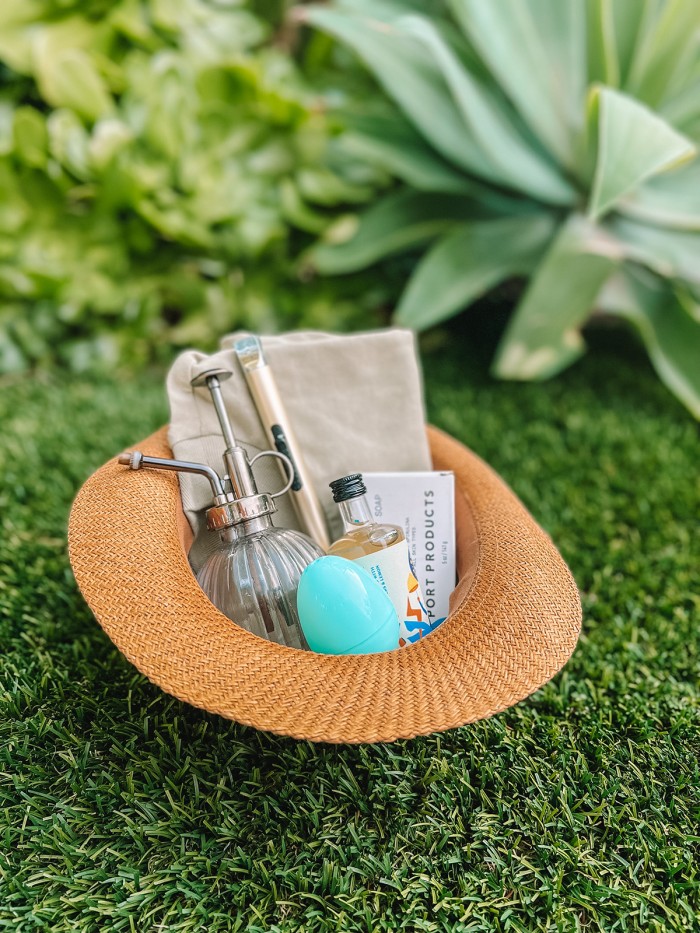 hat used as basket with items inside