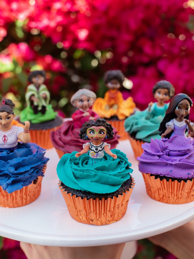 Encanto Party Cupcakes with different Encanto characters on top.