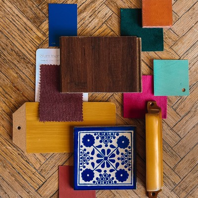 Palm Springs House: Living Room Plans & Inspiration Paint and Fabric Swatches on Wood Table