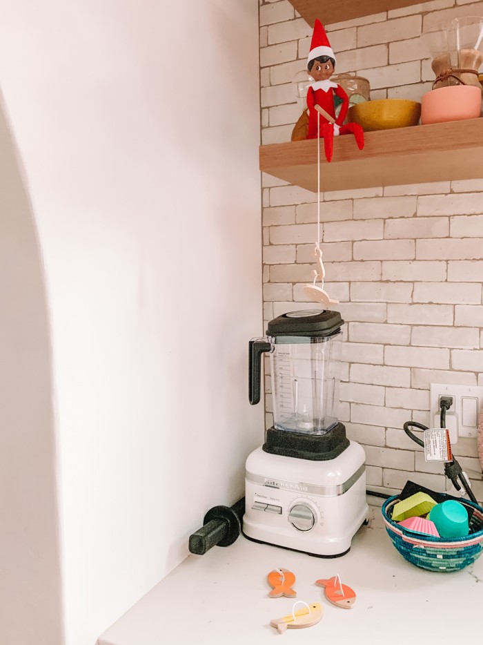 elf fishing in kitchen