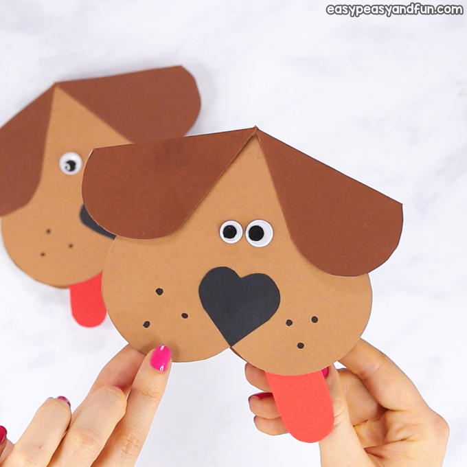 Animal Heart Craft Paper dog that is shaped out of a heart.