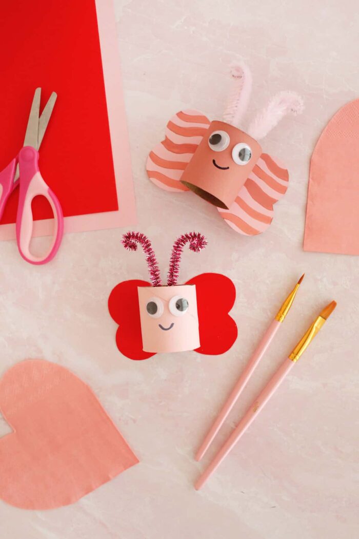 Love Bug Craft Toilet paper rolls cut and turned into little bugs.
