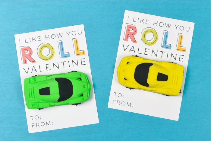 Toy Car Valentine Valentine's messages with toy cars attached on a blue background.