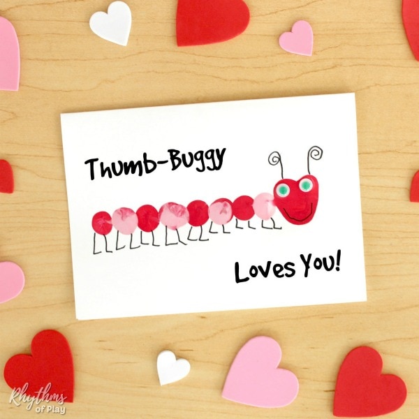 Love Bug Paint Craft Paper with a painted but on the front made out of fingerprints.