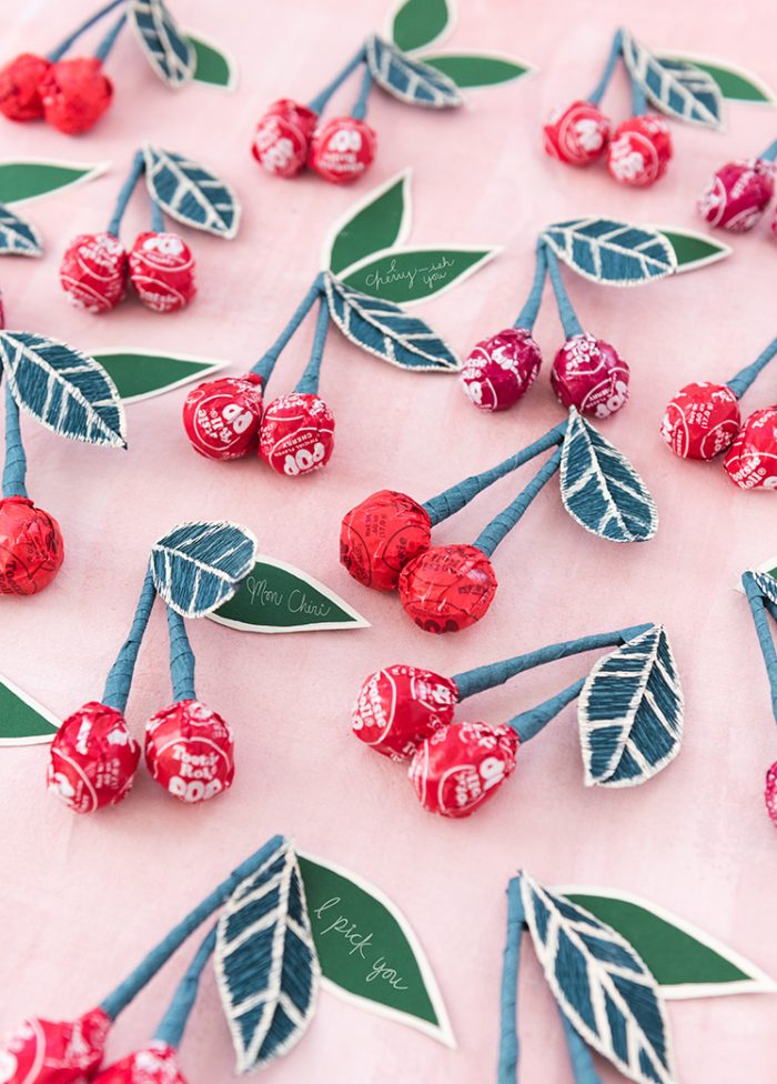 Cherry Lollipop Valentines Tootsie pops tied together to be made to look like cherries.