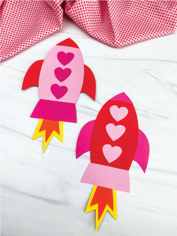 Valentine Rockets Two paper rockets with hearts as windows.