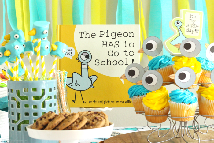Mo Willem Party Mo Willem book next to pigeon cupcakes and pencils.
