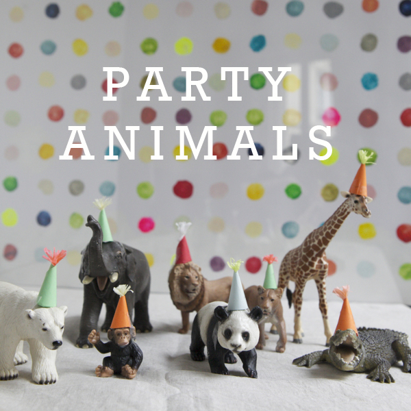 Wild Animal Party Little animal figurines with mini party hats on them and the text says "party animals"