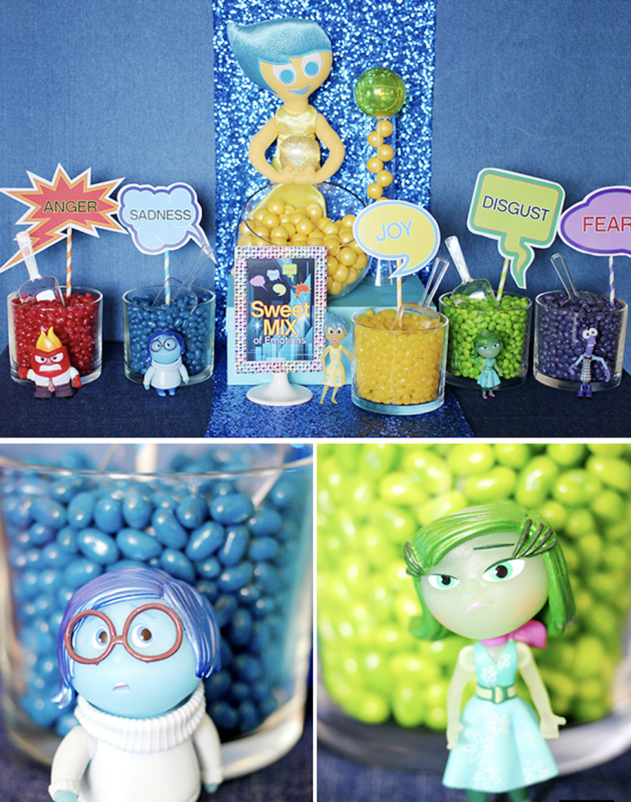 Inside Out Jelly Beans Inside out themed table with different colored jelly beans in glass containers.