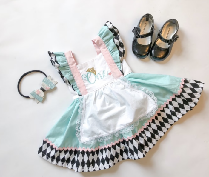 Alice in Wonderland Party Alice in wonderland dress with headband and shoes.