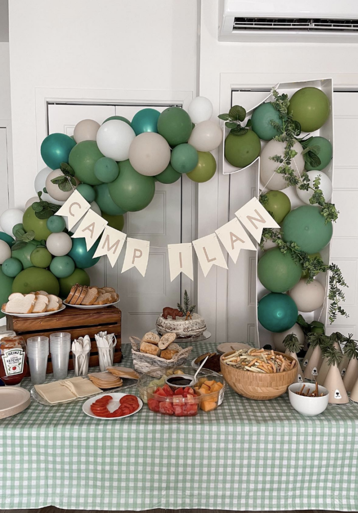 One Happy Camper Party Camper themed party table.
