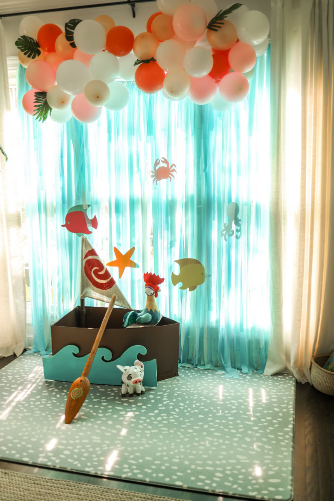 Moana Boat Photo Booth Photo booth with a Moana boat scene.