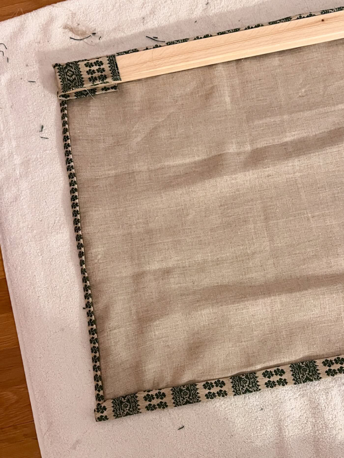 fabric glued to wooden board
