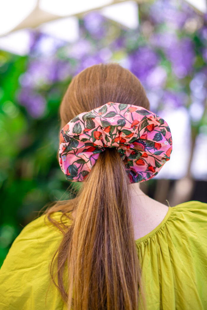 oversized floral scrunchie on ponytail