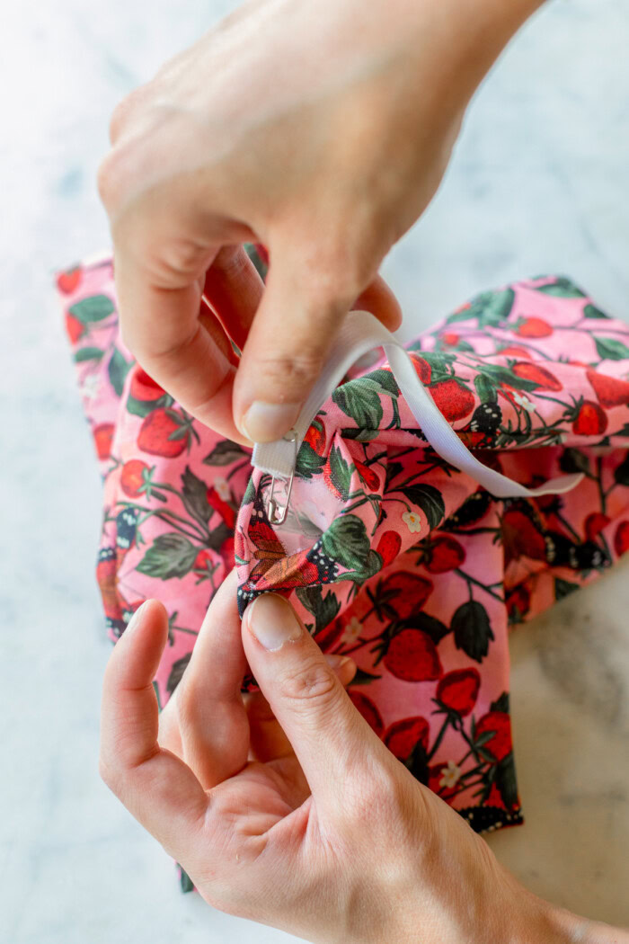 pushing elastic through fabric