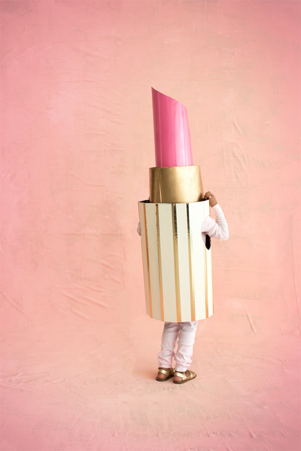 child in lipstick costume