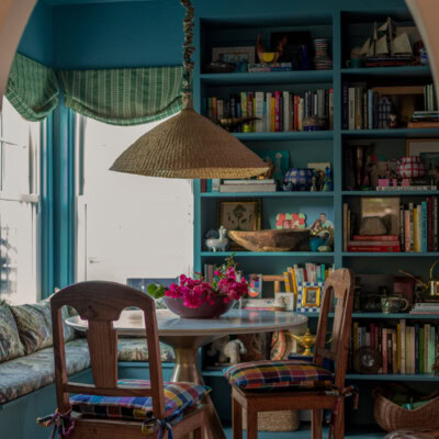 A Cozy Blue Dining Room Blue Dining Room through archway