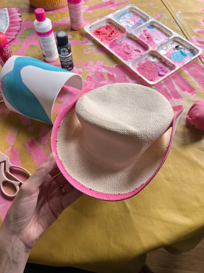 pink painted rim of hat